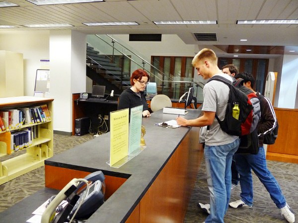 Foster Library Information Desk with Students